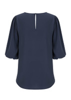 A dark navy puff sleeve top featuring a keyhole back detail and a smooth fabric finish. The top has an understated design.