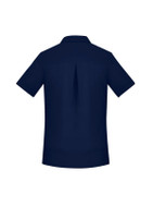 A navy blue women's short sleeve shirt with a back pleat and a collar, featuring a logo.