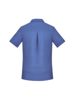 A short sleeve women's shirt in a soft blue colour, featuring a back pleat and a collar. It has a logo on the front.