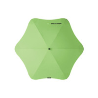 A green BLUNT Classic Umbrella with a unique star-shaped canopy. The umbrella features a central hub and has a logo.