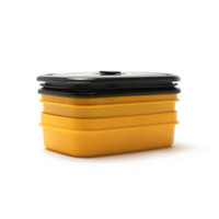 Yellow lunch box container with black lid.