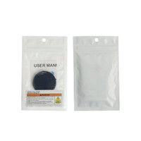 A black Anti Loss Smart Tag packaged in a clear plastic bag with a user manual and warning label.
