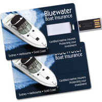 A credit card-sized flash drive featuring a boat image, with a dark blue background and a logo.