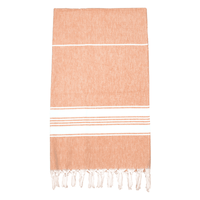 A soft, orange and white striped Turkish towel with fringed edges, featuring a subtle texture.