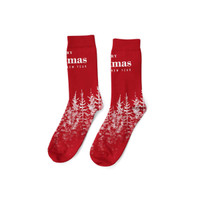 Red festive socks featuring tree and snowflake designs, ideal for the holiday season. Includes a logo on the side.