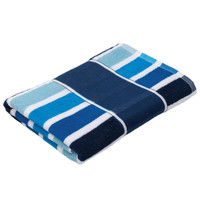 A folded Cabana Towel featuring blue and turquoise stripes, with a logo on the fabric.