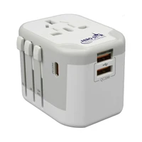 A compact white universal travel adapter with multiple plug options and USB ports for charging devices.
