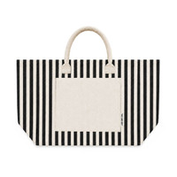 Front view of a black and white striped Hampton tote bag featuring sturdy rounded handles and a large front pocket for everyday essentials.