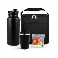 A drink bottle and a travel mug in matte black, alongside a cooler bag and a ziplock with assorted coloured gummies.