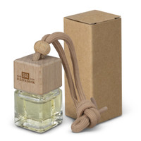 A refillable car air freshener in a glass bottle with a wooden top and a string for hanging, packaged in a brown box.