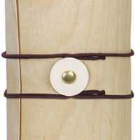 A drink bottle with a natural wood appearance, secured by dark brown straps and a circular fastening.