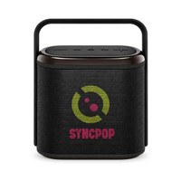 A compact black Bluetooth speaker with a handle and a colourful logo on the front.