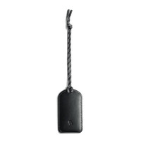 A black luggage tag made of leather, featuring a braided attachment. It has a logo on its surface.