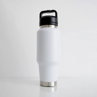 Front view of a white insulated 1L water bottle featuring a sleek minimalist design, stainless steel base accents, and an integrated carry-handle lid.