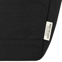 A black cooler tote featuring a recycled cotton label and a simple, sleek design.