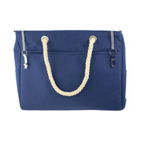 Navy waterproof beach bag with a rope handle and silver clasps, featuring two external pockets.
