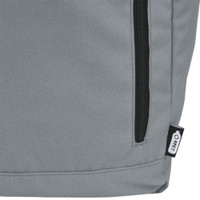 A grey roll-top backpack featuring a zippered pocket and a small brand logo.