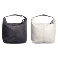 A drink bottle cooler bag in black and cream, featuring a simple design and a shoulder strap. Brand logo visible.