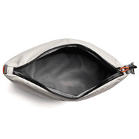 A grey cooler bag with a zipped opening, featuring a black interior and a small logo.