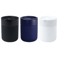 A drink bottle set featuring three ceramic tumblers in black, navy, and white, each with a silicone wrap and a lid.