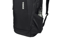 A black backpack with a side pocket holding a drink bottle and a logo.
