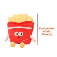 A plush toy shaped like a red French fry container with yellow fries, featuring cartoon eyes and arms.