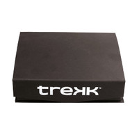 A black box featuring the "trekk" logo, likely for packaging the Trekk 300 Lumens Torch.