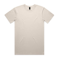 A beige Staple Tee featuring a crew neck design and a logo label inside the collar.