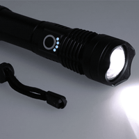 A black 200 lumen LED flashlight with a textured grip and a loop for attaching to keyrings.