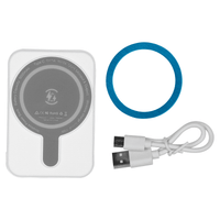 A white magnetic power bank with a grey centre, a blue ring, and a white USB-C cable beside it.