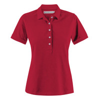 A red women's polo shirt with short sleeves and a buttoned placket. It has a logo on the side.
