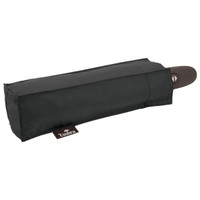 A compact black umbrella with a handle, stored in a rectangular case with a logo.