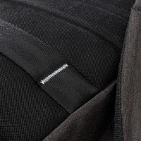Detailed close-up of a Swissdigital Arosa Backpack featuring black mesh fabric and stitching elements.
