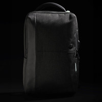 A sleek black backpack with a textured finish and a subtle logo, featuring zippered compartments and a sturdy handle.