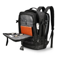 Black travel backpack with open compartments showing organized storage for pens, notebook, and gadgets.