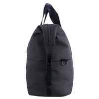 A grey duffle bag with a rounded top, featuring handles and a strap, includes a logo on the front.