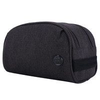 A dark grey toiletry bag with a logo, featuring a rounded shape and a black strap.