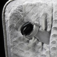 A grey laptop sleeve features a soft, plush interior and an adjustable strap with a clip attachment.