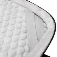 A close-up of the interior padding of a Swissdigital Bolligen 14'' Laptop Sleeve, featuring soft, plush white material.