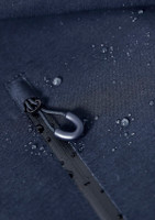 A navy blue rain jacket with water droplets on the fabric, featuring a zipper and a branding label.