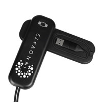 A black foldable charging cable with a USB connector neatly stored inside a case, featuring a logo.