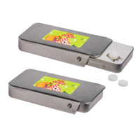 A silver slider tin filled with sugar-free breath mints, featuring a colorful label and two mints beside it.