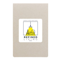 A pack of sticky notes in a light beige cover with a colorful logo featuring a lamp and furniture.