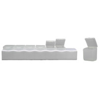 A white weekly pill box with individual compartments and clear lids, designed to organize medication for each day.