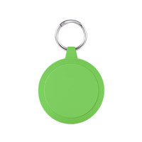A green circular keychain with a metal ring, designed for attaching to keys or bags.