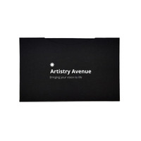 A black pouch featuring a logo, containing an RPET lens cloth set for cleaning devices.