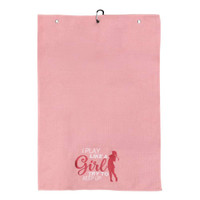 A pink golf towel with a textured surface and a hanging loop, featuring a silhouette and a playful slogan.
