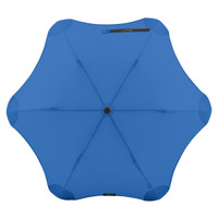 A blue BLUNT Metro Umbrella with a unique octagonal shape and a central black button, featuring branding.