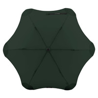 A green BLUNT Metro Umbrella featuring a sleek, rounded design and a central button for closure.