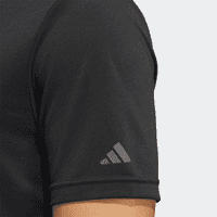 A black polo shirt with a short sleeve, featuring a branding logo on the arm.